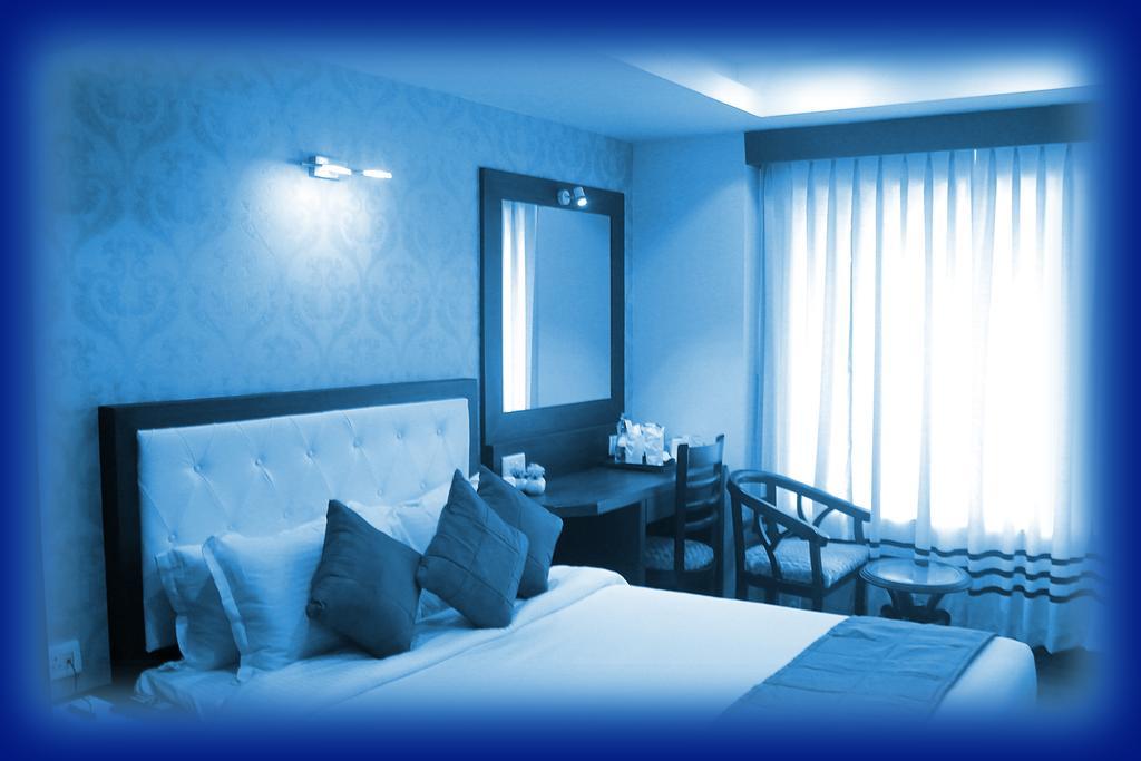 Ethnotel Kalkutta Zimmer foto